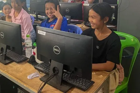 Pupils of Anjali house using the new desktop computers